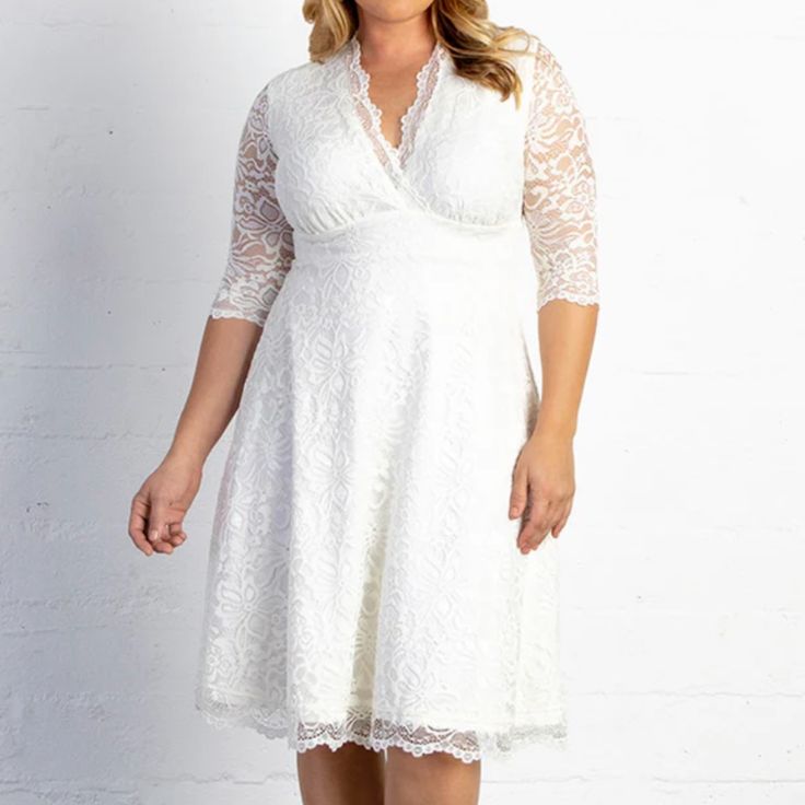 Size 1x Kiyonna White Lace Dress Simple And Feminine Is The Key For Your Special Day In Our Bella Lace Dress. Elegant Scalloped Lace Is Designed With Stretch For A Fabulous Fit, While The Short A-Line Skirt Flatters Your Curves. Go Ahead And Enjoy Your Wedding In Comfort And Style In This Elegant Plus Size Wedding Dress! Measurement: Size 1x Hps To Hem: Approx. 45” From High Point Of Shoulders To Hem. Sleeves: Approx. 15 ½” Long. Waistband: Approx. 40” Around, Relaxed Fabric Content: Lace: 94% Nylon, 6% Spandex; Lining: 92% Polyester, 8% Spandex Care Instructions: Dry Clean Only. Do Not Steam. Cool Iron When Needed. Elegant Plus Size Wedding Dress, Plus Size Wedding Dress, Elegant Plus Size, White Lace Dress, Dress Simple, Plus Size Wedding, Scalloped Lace, Dress Elegant, Lace White Dress