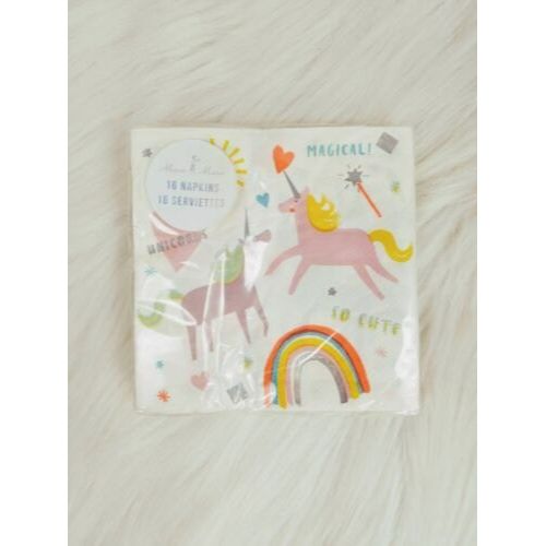 a white sheet with unicorns and rainbows on the side, in front of a white background