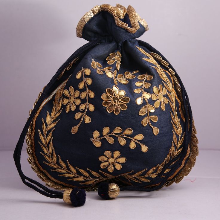 "Traditional India Handcrafted Gota Patti Work Potli Bag Golden Lace Embroidered Handbag For Wedding Bridal Bag Material:Golden Lace, Silk Fabric, Golden Thread, Motifs Color: Red, Pink, Gazri, Navy Blue Package Contents: As per quantity purchased Size: 10\" x 8\" Designed with the heart, this beautiful Potli or batawa bag are eye catchy and made of premium material. Key Features: Gota Patti Work This potli is good match with both Indian and western outfits and are superb for wedding and festive Festive Gold Embroidery Potli Bag, Embroidered Rectangular Potli Bag For Diwali, Traditional Gold Embroidery Potli Bag, Traditional Gold Shoulder Bag With Handwork, Bollywood Style Gold Shoulder Bag With Zari Work, Gold Bollywood Bag With Handwork, Bollywood Style Gold Bag With Handwork, Gold Zari Work Bag For Diwali, Gold Zari Work Pouch Shoulder Bag