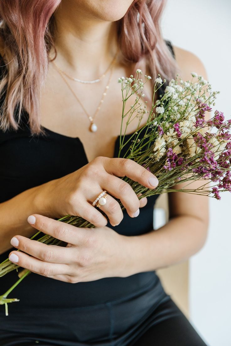 This gorgeous pearl band ring is a win-win situation. its classy, its easy to stack with other pieces, its quality is perfect for daily wear! Each ring is handmade to order, in your size. Please use the drop down menu to choose your ring size and band color at checkout. Sterling Silver or Gold Fill are both meant for everyday wear, are fully hypoallergenic, and do not flake or discolor over time. Unsure of your size? Heres a trick: using a soft measuring tape, gently measure around the finger yo Elegant Stackable Moonstone Ring, Dainty Stackable Pearl Promise Ring, Elegant Rose Gold Midi Rings For Wedding, Delicate Stackable Pearl Ring For Promise, Dainty Pearl Drop Jewelry For Anniversary, Delicate Stackable Pearl Ring As Promise Ring, Elegant Pearl Stackable Rings For Anniversary, Delicate Stackable Pearl Promise Ring, Minimalist Pearl Drop Rings As Gift