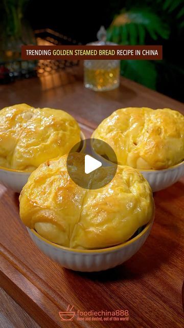 three small pies sitting on top of a wooden table