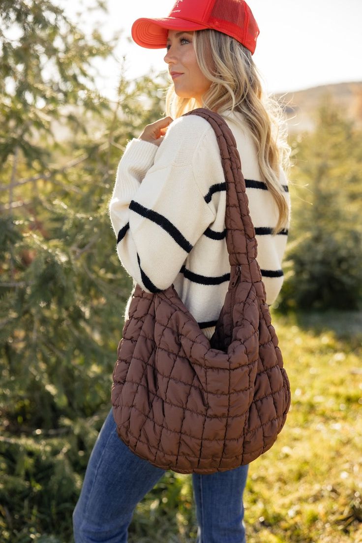 The Muffy Quilted Bag is just darling. It comes in three neutrals so you can choose your favorite. It's large enough to hold all your goodies and features an internal zip pocket and zip closure. approximate dimensions: 17”L x 13”W x 7”D Fall Shoulder Hobo Bag With Zipper Closure, Fall Hobo Shoulder Bag With Zipper Closure, Versatile Quilted Everyday Bag, Daily Use Fall Hobo Bag With Zipper Pocket, Fall Hobo Bag With Zipper Pocket For Daily Use, Fall Satchel Bag With Zipper Pocket, Versatile Quilted Bag For Everyday Use, Fall Travel Hobo Bag With Zipper Closure, Fall Travel Hobo Bag With Zipper Pocket