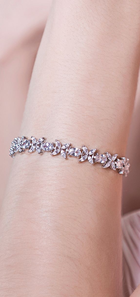 Silver Floral Crystal accents are the perfect accessory to wear for a spring wedding Gold Bracelet Wedding, Silver Bridal Jewellery, Statement Bracelets, Eternity Bracelet, Bridal Jewellery Inspiration, Modern Bracelets, Bridal Fashion Jewelry, White Gold Wedding, Bridal Bracelet