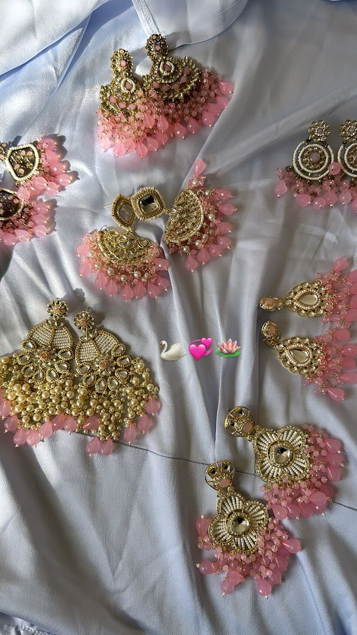 Traditional Baby pink Statement earring  Kundan jhumkis  Pair it to complete your desi look🦢💞 Pink Chandbali Set With Mirror Work, Pink Kundan Sets For Navratri, Pink Gota Work Jewelry For Wedding, Festive Pink Tikka With Meenakari, Pink Kundan Tikka For Festivals, Pink Kundan Tikka For Diwali, Pink Stone Work Tikka For Festive Occasions, Pink Stone Work Tikka For Diwali, Pink Stone Work Tikka For Festivals