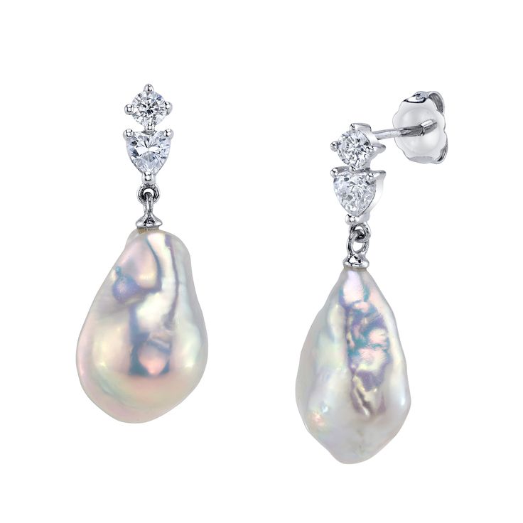 These exquisite pearl earrings add a touch of elegance to any occasion. These earrings feature two lustrous 11-12mm AAA quality Baroque White Freshwater pearls and white cz, hand picked for their gorgeous luster. The pearls are mountings on a sterling silver dangling base. Formal Briolette Earrings With High Luster, High Luster Briolette Earrings For Formal Occasions, Formal High Luster Briolette Earrings, Luxury Pear-shaped Pearl Drop Diamond Earrings, Pear-shaped Pearl Drop Diamond Earrings, Pear-shaped Diamond Earrings With Pearl Drop, Formal Pear Shaped Diamond Pearl Earrings, Formal Pear-shaped Diamond Pearl Earrings, Elegant Briolette Earrings With High Luster