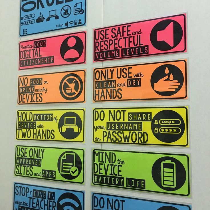 there are many different signs on the wall