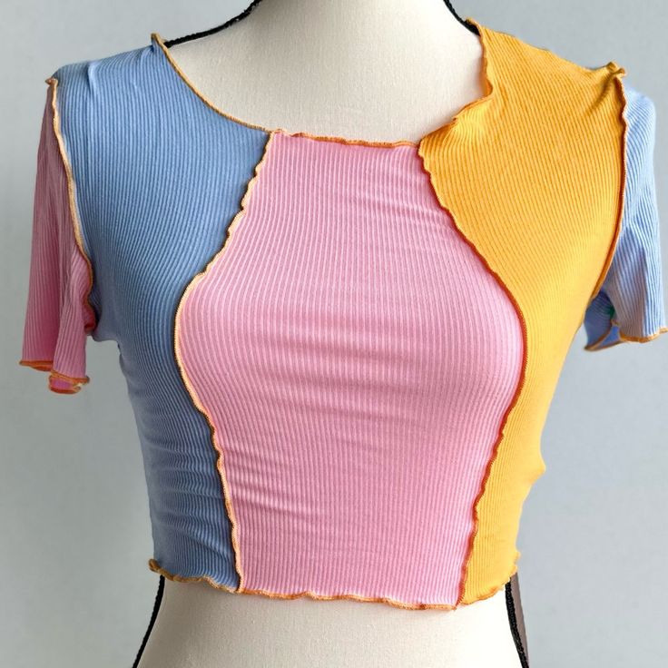 Pink/Yellow/Blue Crop Top With The Back All Blue *Unused* Size: Xs Multicolor Tops With Color Matching For Summer, Multicolor Contrast Color Tops For Summer, Yellow Summer Tops With Contrast Color, Summer Yellow Tops With Contrast Color, Yellow Tops With Contrast Color For Summer, Trendy Color Block Tops, Fitted Multicolor Contrast Top, Fitted Multicolor Contrast Color Top, Trendy Yellow Color Block Tops