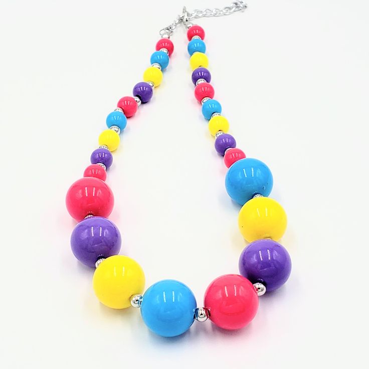 "Great accessory for your lil star, who loves to play dress up. Great for photos or to make her feel snazzy! This would be a perfect gift to make her smile. Necklace is made with 20 mm solid \"bubblegum\" chunky beads and is about 9\" inches long. The spacer beads, lobster clasp, and 3\" inch extension are silver tone. ~WARNING~ All jewelry items are not intended as toys or food. Product parts can be a choking /strangling hazard and as such are not suitable for children under 3 years of age. Do Cute Handmade Plastic Necklace, Cute Adjustable Multicolor Necklaces, Playful Colorful Beads Necklaces For Birthday, Playful Colorful Beads Necklace For Birthday, Fun Round Beads Necklace For Birthday, Cute Colorful Beads Necklace For Birthday, Fun Round Bead Necklaces For Birthdays, Fun Round Beads Necklaces For Birthdays, Fun Round Beads Necklaces For Birthday