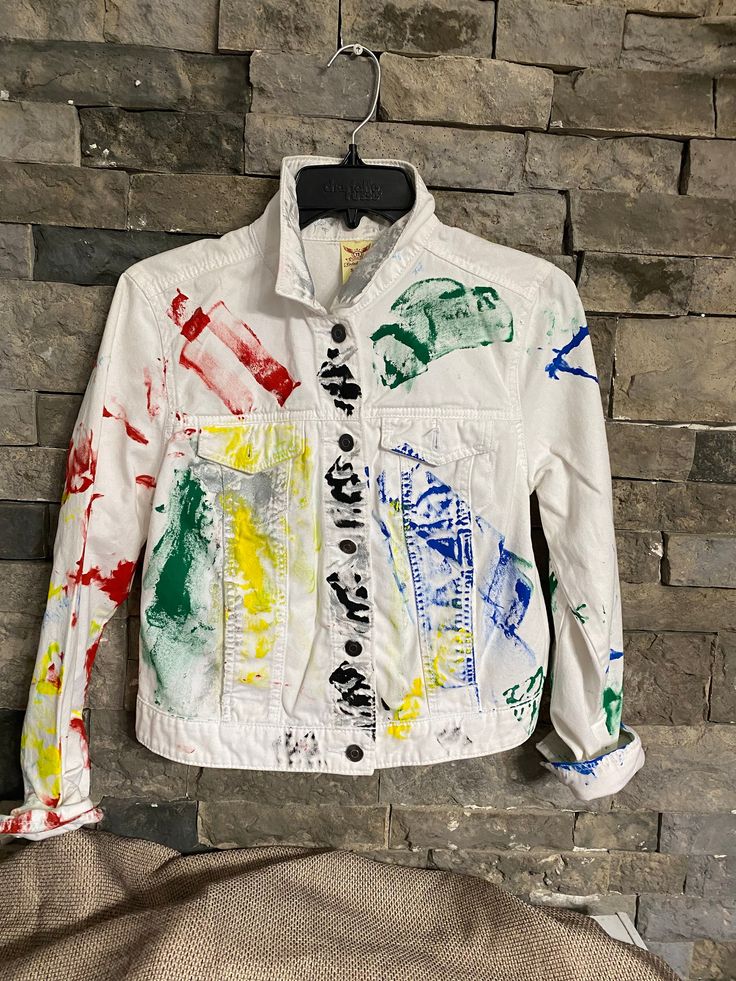 White ladies colorful denim jacket.Custom made one  of one designs. Trendy Multicolor Denim Jacket, Multicolor Cotton Denim Jacket With Pockets, Trendy Multicolor Long Sleeve Denim Jacket, Multicolor Long Sleeve Cotton Denim Jacket, Multicolor Cotton Denim Jacket With Long Sleeves, Trendy Multicolor Winter Denim Jacket, Trendy Multicolor Cotton Denim Jacket, Casual Multicolor Cotton Denim Jacket, Fitted Multicolor Denim Jacket For Streetwear