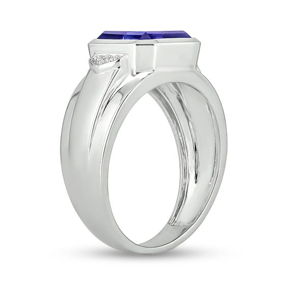 Add a pop of color to his tailored looks with this vibrant fashion ring. Crafted in sterling silver, this choice features a 10.0mm bezel-set radiant-cut bright blue lab-created sapphire. Diamond-accented collars flank the center stone while the tapered shank glistens with stepped borders for added depth. Buffed to a brilliant luster, this ring is sure to be noticed. Formal Sapphire Signet Ring With Polished Finish, Modern Sterling Silver Birthstone Ring For Formal Events, Modern Sterling Silver Birthstone Ring For Formal Occasions, Blue Emerald Cut Rings With Bezel Setting, Blue Emerald Cut Ring With Bezel Setting, Modern Sapphire Ring With Prong Setting, Modern Sterling Silver Round Cut Signet Ring, Modern Sterling Silver Signet Ring, Modern Blue Sapphire Ring For Formal Occasions