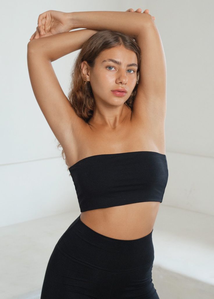 Our Nanna tube makes the perfect addition to your everyday wardrobe. Made from ultra-comfortable OEKO-TEX certified Bamboo, you’ll want to wear it day-to-night. Nanna is double layered, has a cropped cut and a hidden top elastic band - helping her stay in place no matter what! Cropped cut Hidden top elastic band Double layered fabric Natural Organic Bamboo Fabric No pesticides Natural moist wicking Light weight Breathable - Lusy is 175cm and is wearing size M. Workout Bandeau Tube Top With Built-in Bra, Bra Friendly Cropped Stretch Tube Top, Stretch Cropped Tube Top, Bra Friendly, Stretch Cropped Tube Top Bra Friendly, Seamless Stretch Crop Top For Everyday, Everyday Stretch Seamless Crop Top, Casual Stretch Tube Top With Bra-friendly Design, Casual Stretch Tube Top Bra Friendly, Versatile Seamless Crop Top For Loungewear