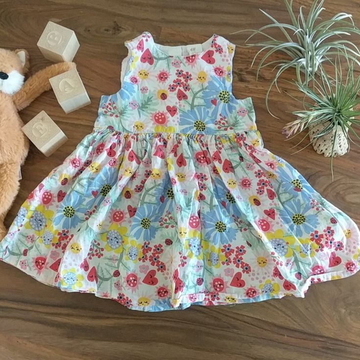 Washed But Unworn, Like New, Never Been Worn Dress By H&M In Size 12-18m. Dress Has Adorable Print With Flowers, Hearts And Ladybugs. 4 Buttons Down Back Of Dress. Super Cute For The Summer! 100% Cotton Sleeveless Sundress For Spring Playdate, Sleeveless Floral Print Dress For Playdate, Playful Spring Sundress For Playwear, Casual Floral Print Sundress For Playtime, Sleeveless Floral Sundress, Cotton Floral Print Sundress For Playtime, Cotton Sleeveless Sundress For Babies, Multicolor Sleeveless Dress For Summer Playtime, Cute Sleeveless Sundress For Playtime