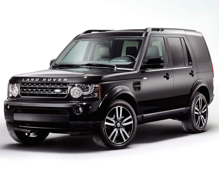 a black land rover is parked in front of a white background