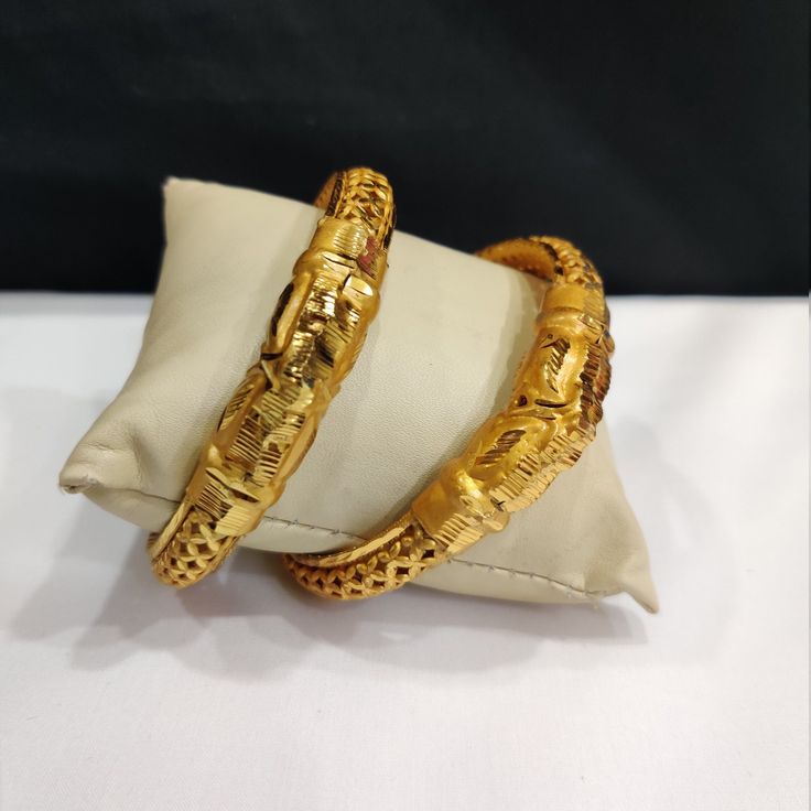 "This Pretty Traditional Pair of bracelet in gold plated Alloy Material. Design: Floral Pattern Color-Gold. Material-Metal/Alloy Available sizes :     2'8 inches   2'10 inches  Obsessed with Indian Jewelry! This is traditional gold-tone jewelry which is carved from our Indian artist. This jewelry are great touch on your collection.  Color may be difference because in few cases color may be different from monitor setting. About Us:  \"Vintage RIvaaz\" works in order to achieve customer satisfacti Elegant Openable Bracelets For Puja, Elegant Openable Bracelet For Puja, 22k Gold Openable Bangle Bracelet, Gold Plated Openable Bracelet In Temple Jewelry Style, Gold Plated Openable Temple Jewelry Bracelets, Gold Plated Bangle Bracelets For Marriage, Gold Plated Bangle For Marriage, Festive Gold Plated Openable Bracelets, 22k Gold Tilla Bangle Bracelet