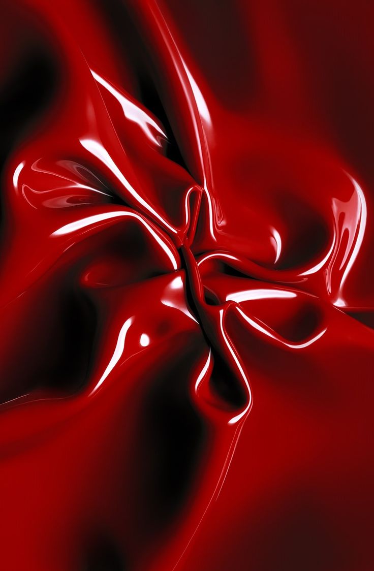 an abstract image of red liquid flowing down the side of a sheet of paper or cloth