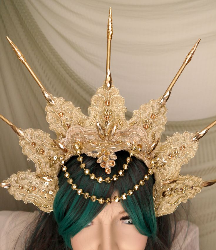 Gold Tiara Crown Halo Headdress This spectacular, shiny crown, is made with Gold lace, bamboo spikes, crystals and beads. This piece is glitters and sparkles with every move. Elegant and regal, this headdress is ideal for making a statement. With so many reflective elements, it is ideal for stage. It can be a great addition to any fantasy costume - Sun Goddess, High Priestess, Greek goddess or Queen. Can be used as a pagan headpiece or tribal headpiece carnival. A beautiful and sparkly headdress Sun Goddess Crown, Queen Headpiece, Jasmine Halloween Costume, Princess Jasmine Cosplay, Princess Jasmine Costume, Gold Goddess, Crown Halo, Watermelon Tourmaline Necklace, Festival Headpiece