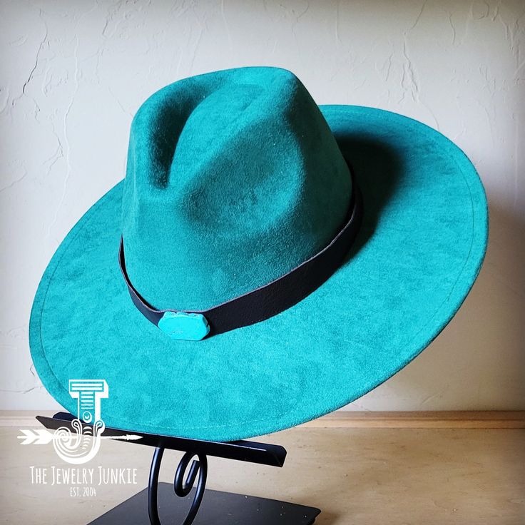 If you’re looking for the perfect accessory to complement your favorite boho style, look no further. The Boho-Style Western Felt Hat w/ Smooth Leather Hat Band by The Jewelry Junkie is absolutely everything that you need. Not only is it easy to incorporate into any and all outfits, but the genuine leather of the band immediately elevates whatever it is you’re wearing. Match your one-of-a-kind hat with any one of the matching accessories that we have for a completely gorgeous look. One Size Hat w Adjustable Green Bohemian Felt Hat, Green Bohemian Fedora, Turquoise Adjustable Fedora With Curved Brim, Adjustable Turquoise Fedora With Curved Brim, Adjustable Wide Brim Turquoise Fedora, Adjustable Turquoise Fedora Hat, Artisan Adjustable Green Hat Bands, Handmade Turquoise Brimmed Hat, Adjustable Turquoise Fedora