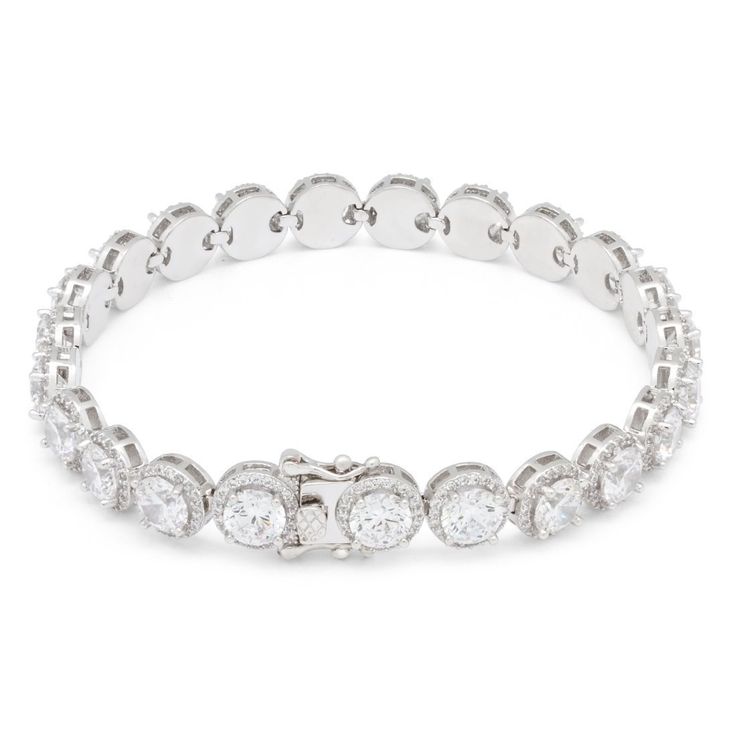 The Round Cut Tennis Bracelet has large brilliant-cut stones all around. Glistening small stones neatly border the large stone for extra ice. The 14K Gold plated bracelet features a tongue box clasp for a secure wear. Available in 14K Gold plating or White Gold plating Elegant Round Iced Out Diamond Bracelet, Elegant Iced Out Sterling Silver Bracelet With Cubic Zirconia, Elegant Iced Out Round Bracelets, Elegant Silver Tennis Bracelet With Bling, Classic Bracelet With Crystal And Diamond Accents, Luxury Round Bracelets With Bling, Classic Crystal Bracelets With Diamond Accents, Iced Out Diamond White Cubic Zirconia Tennis Bracelet, Elegant Iced Out Diamond Tennis Bracelet