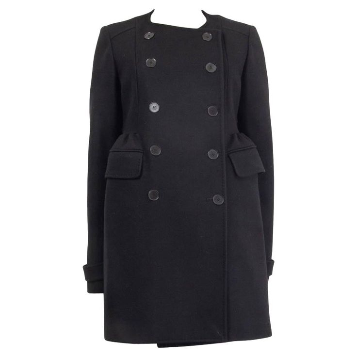 100% authentic Rochas collarless peacoat in black virgin wool (75%), nylon (15%), and cashmere (10%). With bell-shaped gathered waist, pleated back, two flap pockets on the sides, and buttoned cuff straps. Closes with black buttons on the front. Lined in black rayon (100%) featuring one buttoned inside slit pocket. Has been worn and is in excellent condition. Measurements Tag Size 44 Size L Shoulder Width 38cm (14.8in) Bust 94cm (36.7in) to 102cm (39.8in) Waist 90cm (35.1in) to 94cm (36.7in) Hip Black Button, Puffer Coat, Black Wool, Double Breasted, Wool Blend, Cashmere, Coats Jackets, Sleeve Length, Fashion Outfits