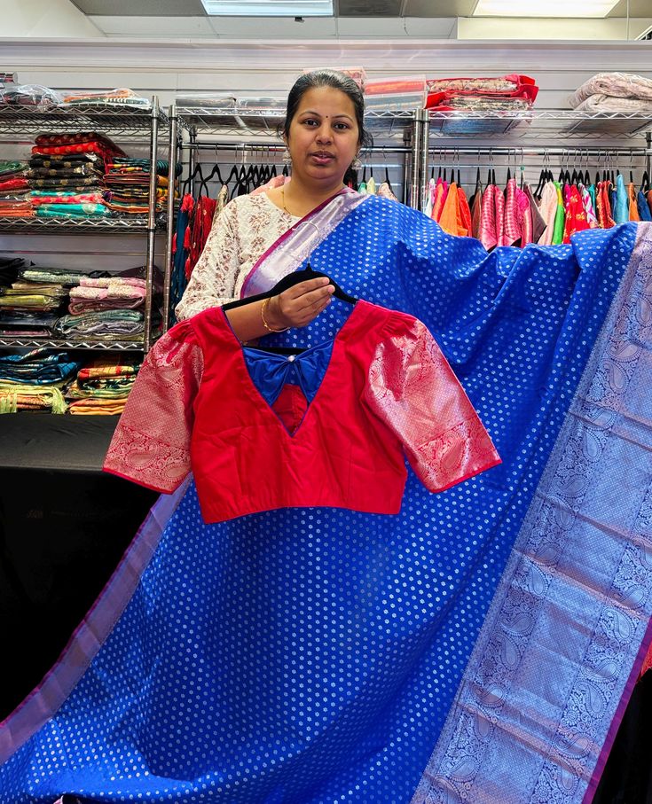 Discover timeless elegance with the Exquisite Blue Luxe Kanjivaram Saree, exclusively at Anandi Fashions. Woven with meticulous craftsmanship, this saree epitomizes luxury and tradition, perfect for any special occasion. At Anandi Fashions, we pride ourselves on offering a wide range of Indian ethnic wear, including sarees, blouses, kurtis, Ghagra choli, lehenga, and artificial jewelry. Embrace the beauty of Indian culture with a piece that stands out for its quality and sophistication. Enhance your wardrobe with this stunning Kanjivaram Saree and experience the unparalleled charm it brings. Blue Saree With Resham Embroidery For Traditional Ceremonies, Blue Silk Saree With Resham Embroidery, Blue Resham Embroidered Saree, Blue Kanjivaram Saree, Blue Kanchipuram Saree, Ghagra Choli, Kanjivaram Sarees, Indian Ethnic Wear, Lehenga