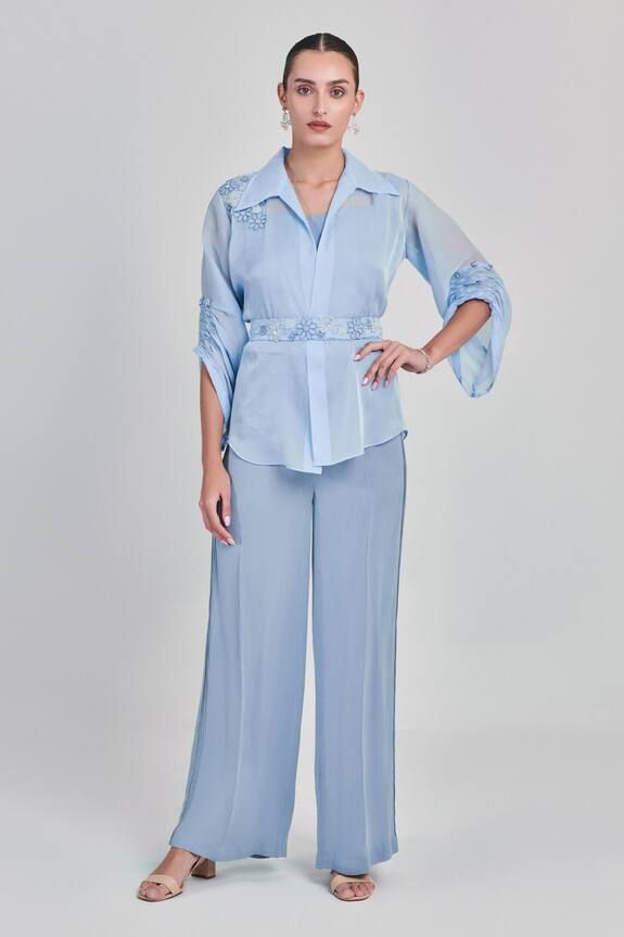 Soft blue shirt with bead, sequin embroidery in floral placement pattern. Paired with inner, pant and belt. - Aza Fashions Elegant Floral Embroidery Pant Set With Straight Pants, Elegant Pant Set With Floral Embroidery, Elegant Floral Embroidery Pant Set For Party, Elegant Long Sleeve Embellished Pant Set, Elegant Embroidered Summer Pant Set, Elegant Floral Embroidered Pant Set For Summer, Elegant Floral Embroidery Pant Set For Summer, Elegant Summer Pant Set With Floral Embroidery, Elegant Embellished Summer Pants