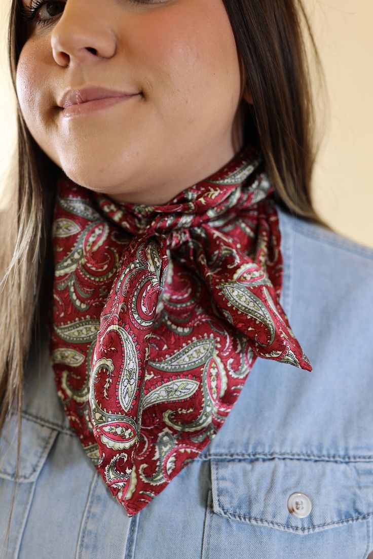 Our beautiful new line of wild rags are so fun and great for the upcoming seasons! Tie this in your hair, around your neck, or around your purse and you're set! Scarf is 100% Silk. Size: Regular Wild rag measures 34.5 x 34.5 inches. SKU: #Paisley-Wine/Olive Trendy Fall Bandana, Trendy Gift Bandana One Size, Red Bandana Print Scarf As Gift, Red Bandana Print Scarves For Gift, Red Bandana Print Scarf Gift, Wild Rags, Wild Rag, New Line, Silk Scarf