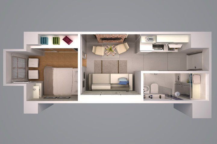 an overhead view of a small apartment with kitchen, living room and bedroom areas in it