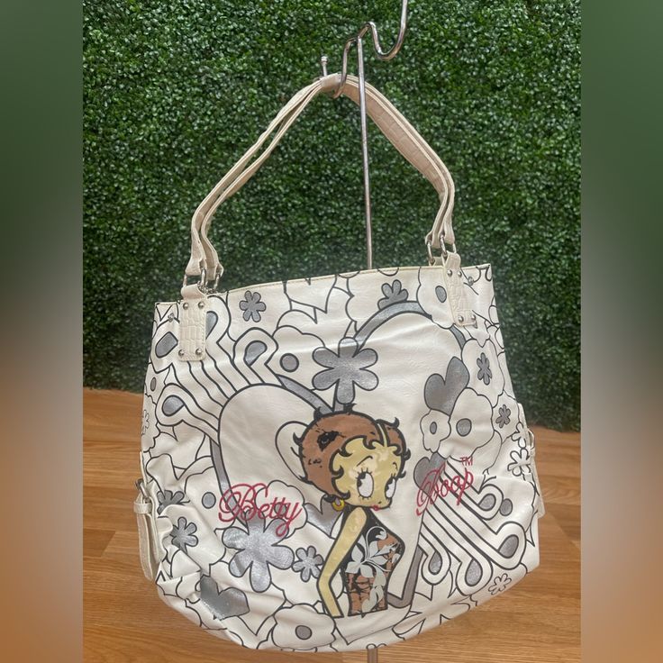 Betty Boop Vintage Tote Bag- Nwt But Peeled From The Betty As Seen In Picture! Retro White Bag With Adjustable Strap, Vintage White Satchel For Shopping, Vintage White Bag For Errands, White Retro Satchel For Shopping, White Retro Shoulder Bag For Everyday Use, White Retro Tote Shoulder Bag, Retro White Tote Bag, Retro White Bags For Everyday Use, Retro White Bag For Everyday Use