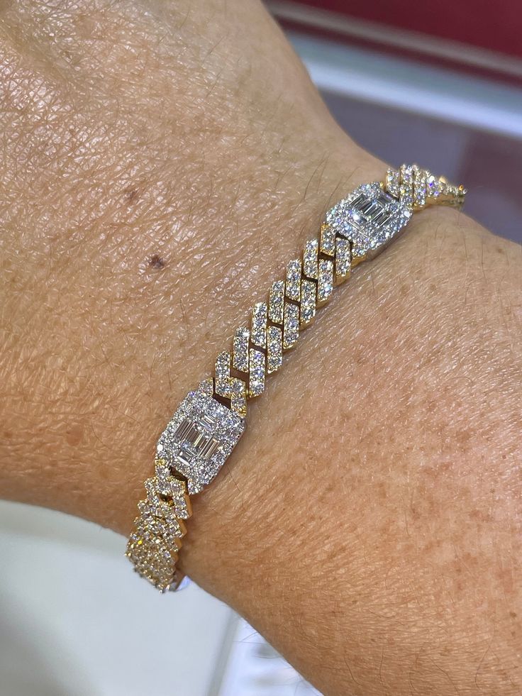 Beautiful Diamond Link Bracelet Two Tone 18K White Gold and 18K Yellow Gold Fine quality diamonds  Total weight: 5.23 carats 29 grams of 18K gold.  Classy and Unique design. 7 inches in length.   Excellent craftsmanship, strong links.   Good quality diamonds, no black carbon spot when viewed under a magnifying glass.   Natural earth mined diamonds  Rounds: 4.55 carats total weight Clairty: SI Baguettes: 0.68 carats total weight  Clarity: VS Color: F All White and shiny diamonds, no cloudy or yel Bracelet Emerald, Diamond Bracelet Design, Bridal Fashion Jewelry, Bracelets Gold Diamond, Magnifying Glass, Cuban Link, Bridal Fashion, Natural Earth, Jewelry Business