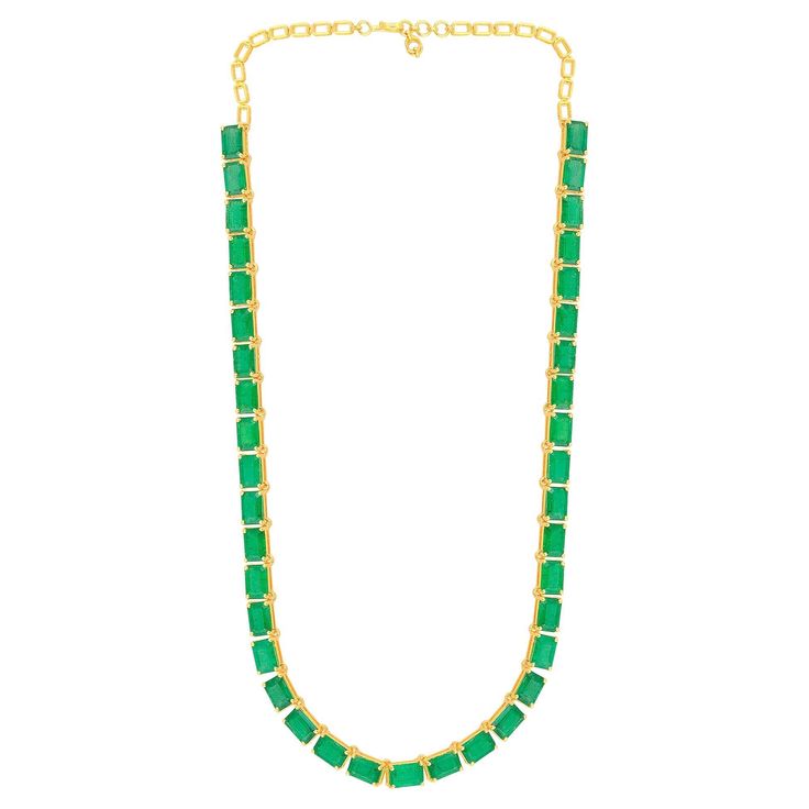 Crafted with meticulous attention to detail, this necklace showcases exquisite craftsmanship and a commitment to excellence. The 14k yellow gold setting provides a warm and luxurious backdrop for the emeralds, enhancing their color and creating a harmonious composition. The choker length adds a modern and trendy touch, gracefully adorning the neckline. Item Code :- SEN-5124 (14k) Gross Weight :- 18.52 gm 14k Yellow Gold Weight :- 13.94 gm Emerald Weight :- 22.90 carat Necklace Length :- 16 Inche Green Diamond Necklace For Formal Occasions, Formal Green Hallmarked Diamond Necklace, Luxury Emerald Gemstone Necklace For Formal Occasions, Elegant Green Emerald Necklace In 22k Gold, Elegant 22k Gold Green Emerald Necklace, Elegant Green Emerald 22k Gold Necklace, Formal Single Strand Emerald Necklace, Formal Gold Chain Necklace With Gemstone, Elegant 22k Gold Emerald Gemstone Necklace