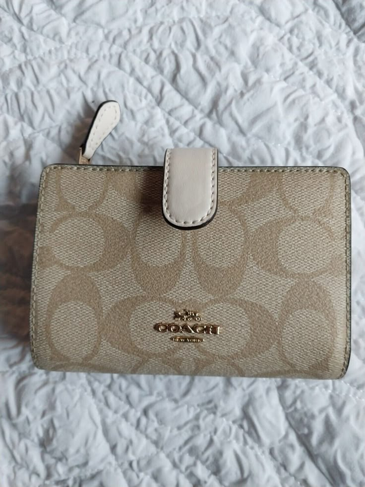 Coach Monogram Wallet, Cream Bifold Wallet With Interior Card Slots, Cream Bifold Wallet For Daily Use, Classic Coach Wallet In Cream Color, Classic Coach Cream Wallet, Cream Bifold Wallets For Travel, Classic Cream Coach Wallet, Coach Cream Wallet With Zipper Closure, Coach Wallets For Women