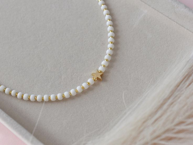 Star Seed Bead Necklace Beaded Choker Custom Beaded - Etsy White Dainty Necklace With Spacer Beads, Dainty White Necklace With Spacer Beads, White Beaded Chain Choker As A Gift, White Beaded Chain Dainty Choker, White Dainty Beaded Chain Choker, Dainty White Beaded Chain Choker, Star-shaped Beaded Chain Necklace For Gift, Star-shaped Beaded Necklace For Gift, White Choker With Gold Beads As Gift