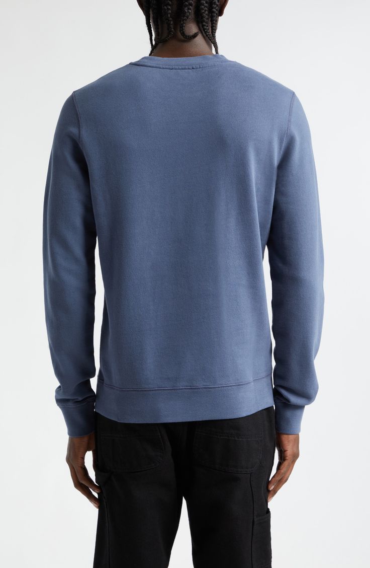 Classic and comfortable, this sweatshirt cut from cotton French terry makes a great layer and promises to age with you like a well-loved old friend. 27 1/2" length (size Medium) Crewneck Banded cuffs and hem 100% cotton Machine wash, dry flat Made in Portugal Designer Clothing Washed Blue Sweatshirt With Ribbed Cuffs, Soft-washed Blue Sweatshirt For Fall, Washed Blue Crew Neck Sweatshirt Soft-washed, Washed Blue Crew Neck Sweatshirt For Fall, Soft-washed Crew Neck Sweater For Layering, Blue Washed Crew Sweatshirt, Washed Blue Crew Neck Sweatshirt For Winter, Blue Crew Sweatshirt For Layering, Long Sleeve Soft-washed Sweatshirt In Washed Blue