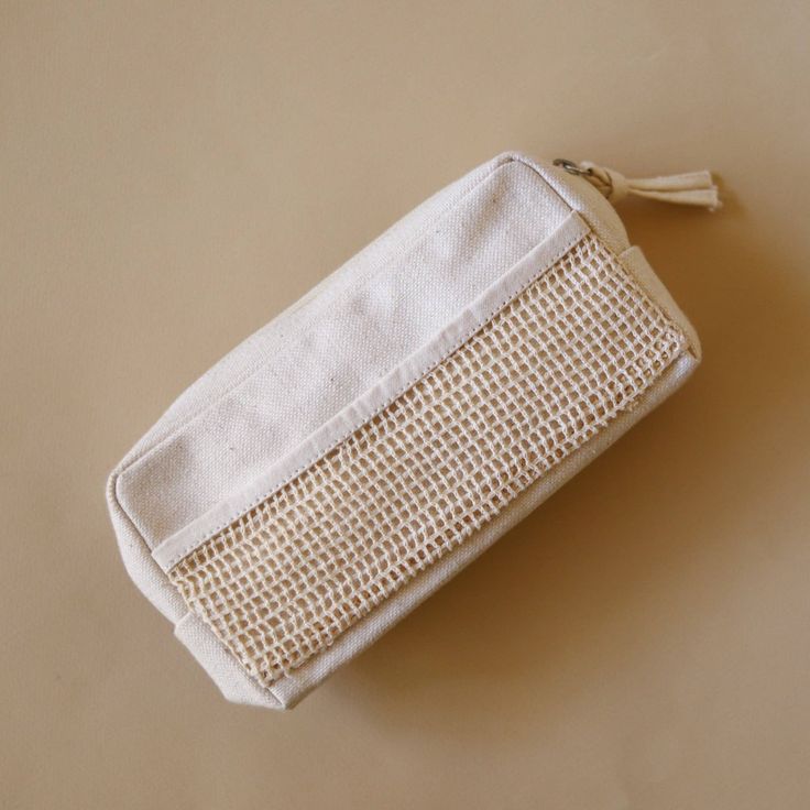 The Organic Lifestyle Accessory Pouch With Netting - Small offers a stylish and sustainable solution for organizing your small cosmetics and essentials. Whether for personal use or as a thoughtful gift, this pouch combines functionality with conscientious living, making it an essential accessory for eco-conscious individuals. Dimensions: 17cm x 4cm x 9cm Cute Cheap Pouch For Everyday Use, Affordable Everyday Pouch Box Bag, Cheap Modern Pouch For Daily Use, Modern Cheap Pouch For Daily Use, Cheap Pouch For Personal Use, Trendy Portable Pouch, Cheap Everyday Pouch Backpack, Cheap Eco-friendly Bags With Zipper Pouch, Cheap Minimalist Pouch Bag