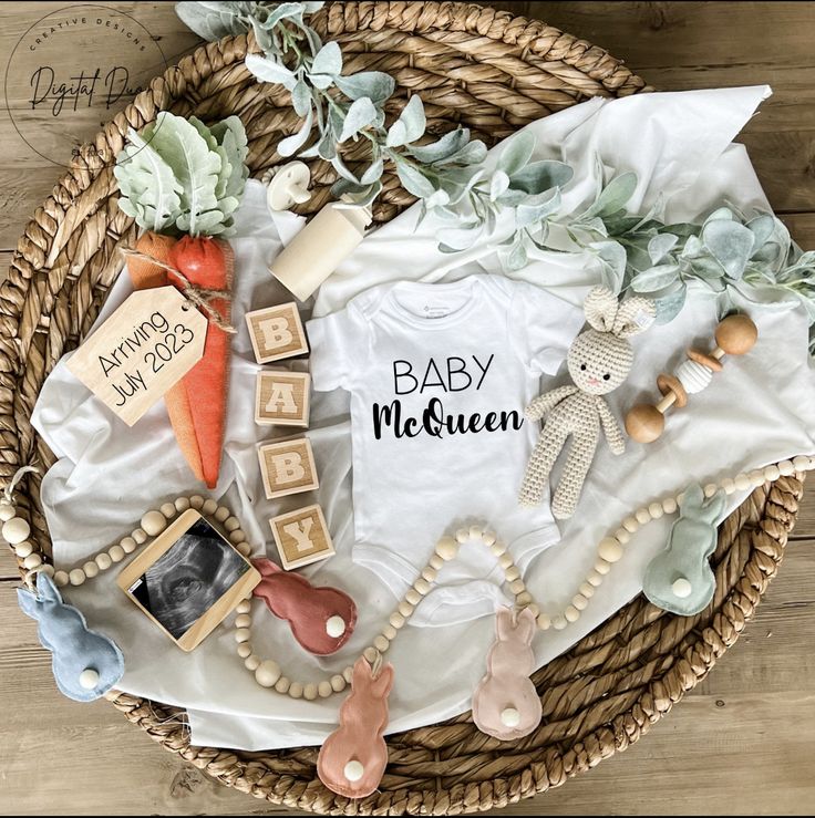 a basket filled with baby items on top of a wooden floor