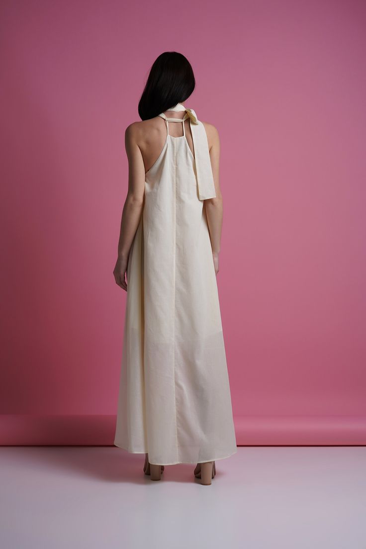 "A light summer dress featuring maxi length, tie neck , and open shoulders. - tie neck - open shoulders - sleeveless - matching fabric belt - long skirt - a-line silhouette - lined Fiber: 100 % cotton Color: milky white For size S: length- 55\" (140 cm) Our model wears size S (US 6) and is 177cm/5'9\" tall. You may feel free choosing the size. Just send us your measurements (bust, waist, hips, height). We will define your correct size. MORE DRESSES: https://www.etsy.com/shop/TAVROVSKA?ref=hdr_sh Summer Wedding Halter A-line Dress, Cream A-line Maxi Dress For Summer, Floor-length Halter Dress For Spring Vacation, Summer A-line Maxi Dress With Tie Back, Summer Floor-length Halter Dress With Tie Back, Summer Wedding Halter Neck Maxi Dress, Summer Wedding Halter Neck Dress, Summer Wedding Floor-length Maxi Dress, Flowy Halter Floor-length Summer Dress