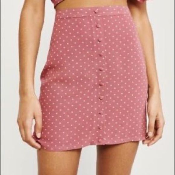 You Can’t Have A Bad Day In Polka Dots! This Versatile Mini Skirt From Abercrombie & Fitch Can Be Dressed Up Or Down, Depending On The Vibe. Excellent Condition, Never Worn. Features- Buttons Are Decorative & Not Functional Side Zipper Elastic Back Lined Fitted Pink Button-up Bottoms, Fitted Mini Skirt With Button Closure, Fitted Mini Skirt With Button Closure For Summer, Summer Button-up Mini Skirt With Buttons, Spring Fitted Button-up Mini Skirt, Pink Skirt With Button Closure, Summer Mini Bottoms With Buttons, Pink Mini Skirt With Button Closure For Spring, Fitted Button-up Mini Skirt For Day Out