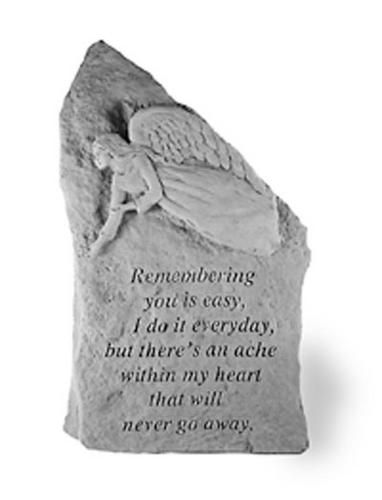 a memorial stone with an angel on it that says, reembering you is easy