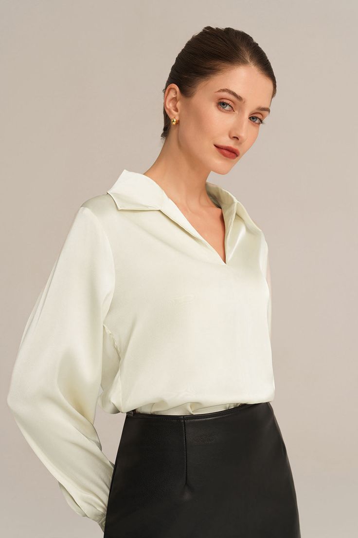 Experience the epitome of elegance with our Satin Blouse. Combining a loose fit with a smooth and comfortable fabric, this blouse is designed to make you feel effortlessly stylish. With long sleeves, a flattering V-neck, and a lapel collar, this piece exudes timeless charm. Material : 95%Polyester+5%Elastane.Elasticity : Low Stretchy.Sku : CL2156A23Package : 1*TopsCare instructions: Max wash temp: 30℃, No bleach, No tumble dry, Iron max 110℃, Wash dark colors separately, No PU ironing. Chic Solid Color V-neck Shirt, Beige Long Sleeve Office Blouse, Chic Solid V-neck Long Sleeve Top, Elegant Solid Color Shirt For Spring, Formal V-neck Solid Color Tops, Elegant V-neck Top, Beige V-neck Blouse For Office, Solid Plain V-neck Blouse, Solid Color Plain V-neck Blouse