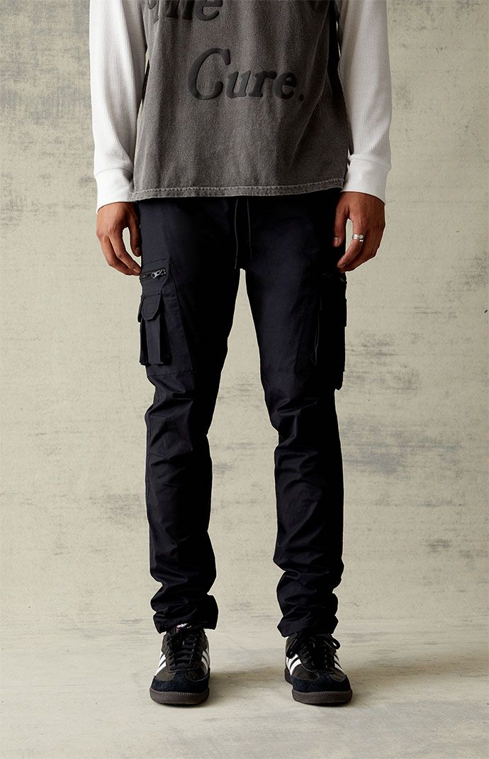 Casual meets cool with the new Stretch Black Slim Cargo Pants from PacSun. This go-to pair is designed with an elastic stretch waistline, adjustable drawstrings, side pockets, zip cargo pockets, a drawcord hem, and a slim fit.

Learn more about PacSun eco items Functional Black Cargo Bottoms, Functional Black Cargo Style Bottoms, Utility Bottoms With Functional Drawstring For Outdoor, Utility Bottoms With Functional Drawstring For Outdoor Activities, Black Utility Joggers With Side Pockets, Black Urban Joggers With Cargo Pockets, Black Relaxed Fit Joggers With Cargo Pockets, Black Relaxed Fit Cargo Joggers, Functional Black Cargo Pants With Pockets