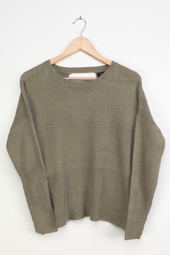 Lulus Exclusive! We've double checked and the Lulus Cross Reference Sage Green Oversized Backless Sweater comes up as cute every time! Textured sweater knit creates a rounded neckline, an oversized bodice, and long sleeves with drop shoulders and fitted cuffs. Wide back cutout is formed by two overlapping panels for a fun finish! Ribbed knit at the neckline, cuffs, and long hem. Fit: This garment fits true to size. Length:  Size small measures 23.25" from shoulder to hem. Bust: Great for any cup Oversized Textured Knit Top For Fall, Oversized Cable Knit Top For Fall, Oversized Fall Cable Knit Top, Slouchy Textured Knit Long Sleeve Sweater, Slouchy Long Sleeve Knit Cropped Sweater, Oversized Cable Knit Tops For Layering, Oversized Cable Knit Tops For Spring, Textured Knit Top With Batwing Sleeves For Fall, Oversized Textured Knit Cropped Sweater