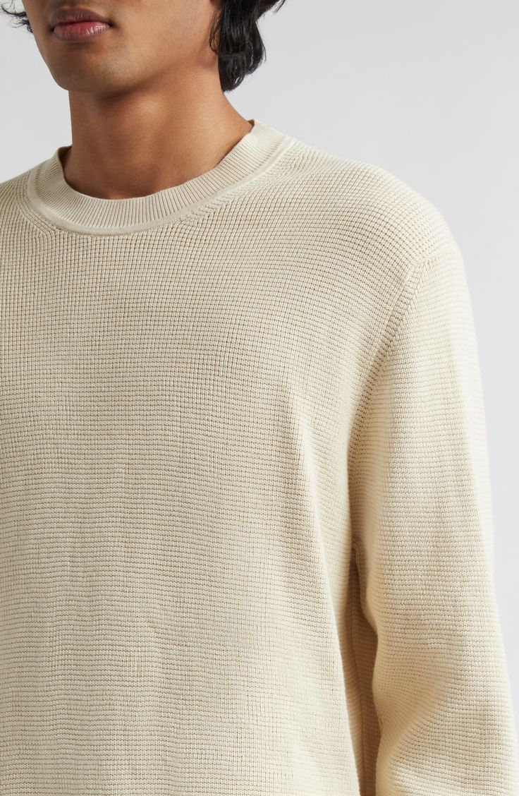 A finely knit waffle stitch brings light texture and elevated comfort to this season-spanning cotton sweater that's versatile and layer-friendly. 27" length (size Medium) Crewneck Long sleeves Ribbed cuffs and hem 100% cotton Machine wash, dry flat Made in Portugal Designer Clothing Neutral Crew Neck Sweater With Textured Knit, Beige Waffle Knit Sweater For Spring, Textured Crew Neck Spring Sweater, Off White Textured Knit Crew Neck Top, Off White Textured Knit Crew Neck Sweater, Cream Textured Knit Sweater For Everyday, Everyday Cream Textured Knit Sweater, Cream Textured Knit Sweater For Layering, Knit Waffle Stitch