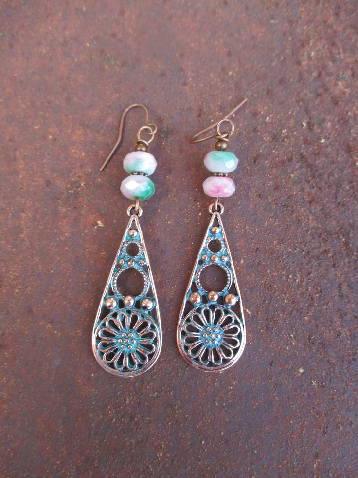 ♥Jewelry designs made by hand with heART♥ These earrings feature copper verdigris finish flower design teardrop charms dangling from Candy Cane Jade gemstones and copper finish accent beads.  They measure a tad over 2 3/4 inches from the top of the pierced ear wires.  Handmade and ready to ship. Ready to give away or to treat yourself! Enjoy ♥ Thank you for visiting ♥third time charms♥ Nickel Free Teardrop Metal Flower Earrings, Nickel-free Metal Teardrop Flower Earrings, Handmade Adjustable Teardrop Flower Earrings, Bohemian Nickel-free Flower Earrings For Jewelry Making, Bohemian Teardrop Nickel-free Clip-on Earrings, Bohemian Teardrop Plug Earrings, Bohemian Teardrop Plug Earrings As Gift, Bohemian Teardrop Plug Earrings For Gift, Bohemian Teardrop Nickel Free Clip-on Earrings