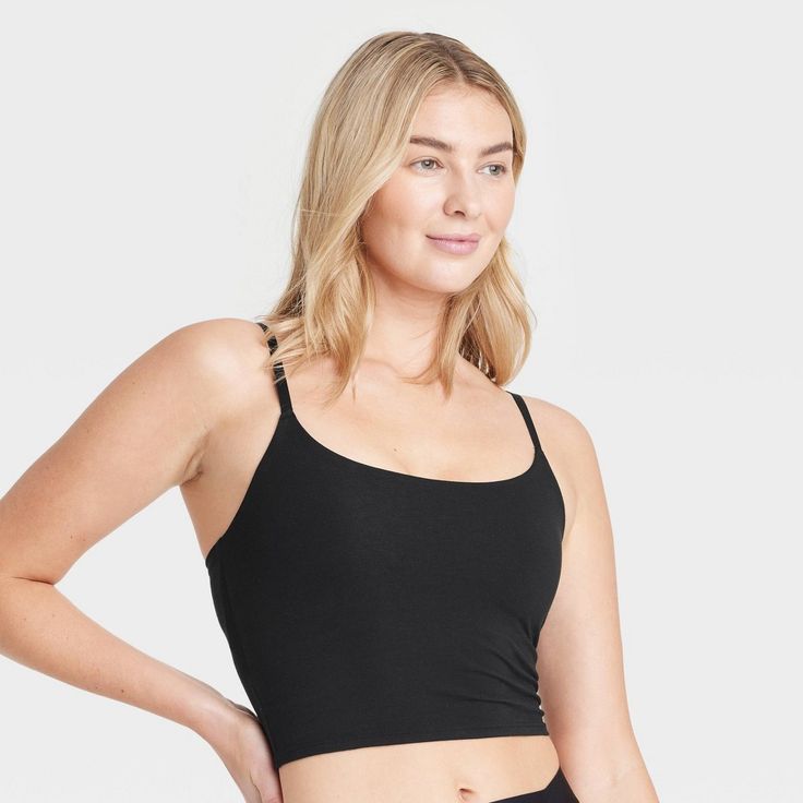 Give your everyday intimates a comfy upgrade with this Cotton Stretch Crop Cami Bralette from Auden™. This crop cami bralette is made of cotton jersey fabric with added spandex for a flexible fit that moves with you, while opaque lining provides extra coverage. The adjustable straps help you find the right fit, and unlined, wireless cups round out the design for support that maintains a natural, comfortable shape. Plus, removable padding provides a customized coverage. Auden™: Comfort true to ev Cotton Jersey Fabric, Triangle Bralette, Cropped Cami, Hem Style, Cropped Tank Top, Crop Tank, Jersey Fabric, Fitness Fashion, Bralette