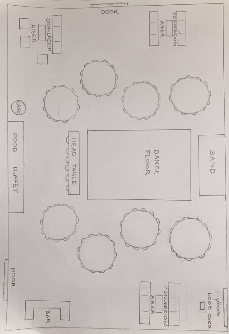 the floor plan for an office with several tables and chairs, including one chair in the middle