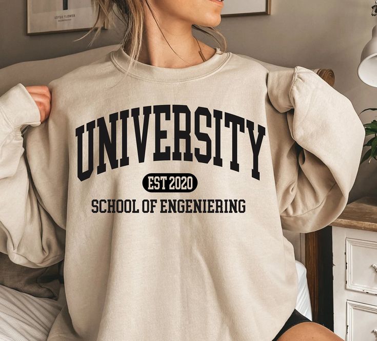 🎅LAST DAYS FOR CHRISTMAS DELIVERY.🎅 USA →  12/12/2023  CANADA → 12/12/2023 EUROPE →  12/12/2023 Custom College Sweatshirt, Personalized College Sweater, Customized School Sweatshirt, Custom Pullover, University Hoodie, College Program Each sweater is printed on order with love ❤ This sweater essential fits like a well-loved favorite. The excellent quality print makes one to fall in love with it over and over again. Size chart available in photo. Any questions? Just ask :) Want to personalise something? Just drop me a line... Halloweentown Movie, Halloween Town Movie, Silly Goose University, Halloweentown University, College Sweater, University Hoodie, School Sweatshirts, University Shirt, Christmas T Shirt Design