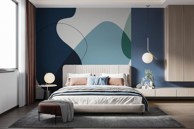 a modern bedroom with blue and white decor