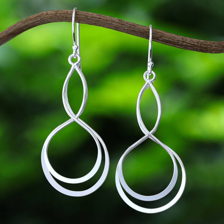 Sinuous and shiny formations create a unique accessory perfect for a chic style. Pichaya's dangle earrings are crafted in Thailand from sterling silver and later polished for an elegant look. Silver Dangle Earrings, Sterling Silver Dangle Earrings, Silver Earrings Dangle, Hook Earrings, Accessories Unique, Chic Style, Silver Necklace, Dangle Earrings, Motion