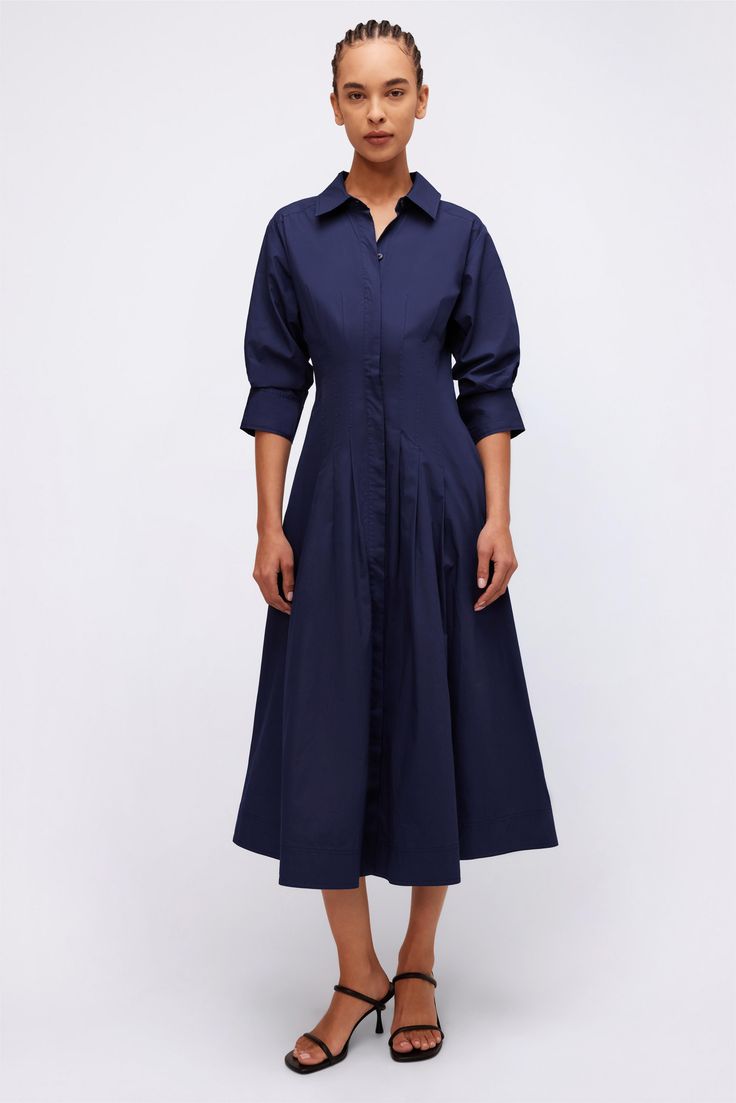 The Jazz Dress in Midnight. Sharp, shirting inspired designs accentuate a pintucked waist, cuffed sleeves and a classic midi length hemline. Office Wear Midi Shirt Dress With Button Cuffs, Classic Pleated Cotton Midi Dress, Formal Cotton Midi Dress, Classic Cotton Midi Dress For Office, Classic Shirt Dress With Cuffed Sleeves For Daywear, Elegant Cotton Midi Dress With Pleated Sleeves, Elegant Collared Dresses With Cuffed Sleeves, Elegant Shirt Dress With Pleated Hem For Workwear, Long Sleeve Cotton Midi Dress For Formal Occasions