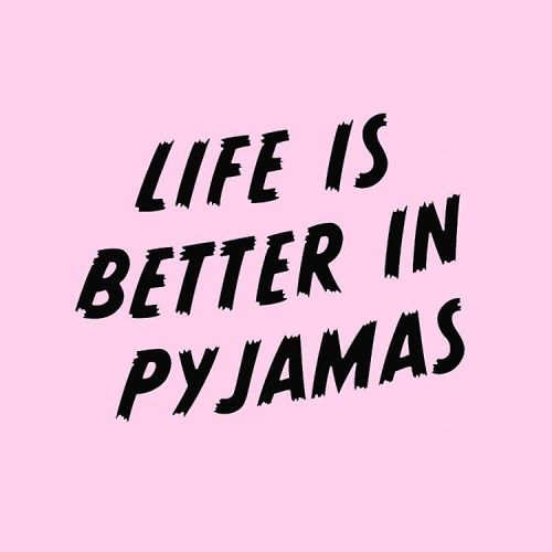 the words life is better in pyjamas are black and white on a white background